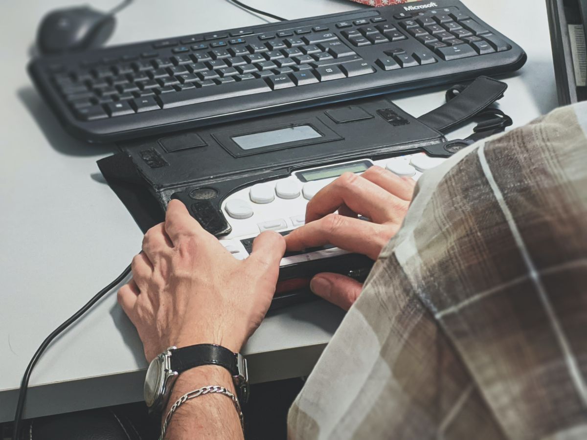 person using accessible keybord